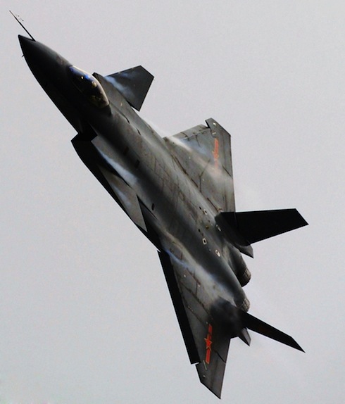 Chengdu J-20 fifth generation fighter from China banks into a high angle turn.