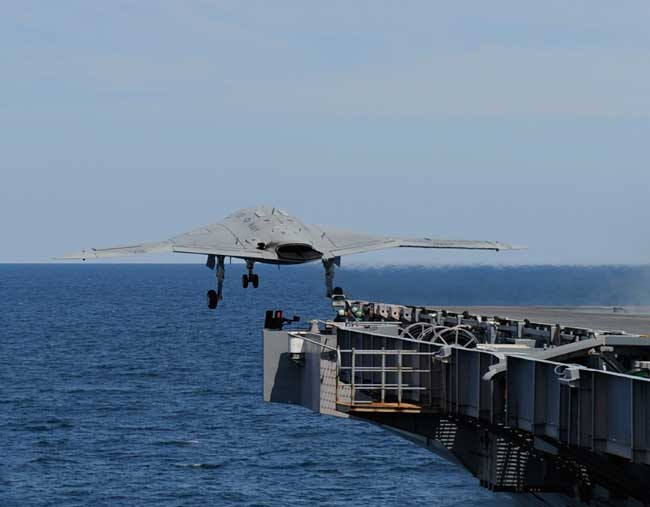 US Navy / Northrop Grumman X-47B Unmanned  Combat Aerial Vehicle takes off from W.G Bush on its maiden launch from an aircraft carrier, May 14, 2013. Photo: Alan Radecki, Northrop Grumman