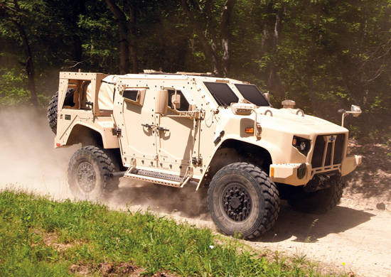 Oshkosh is submitting the Light Armored Tactical Vehicle (LATV) design for its proposed version of the JLTV. The LATV is seen here racing through the SART course at Quantico, June 2013. Photo: Oshkosh.