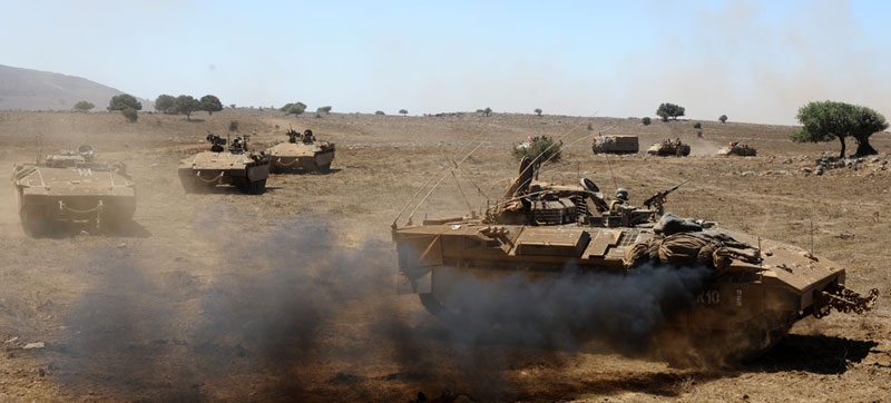 A column of Namer Infantry Combat Vehicles (ICV) of the Golani 13th infantry battalion seen on an exercise in the Golan Height, 2012. The brigade is expected to receive the full complement of ICVs, but  the current budget is not expected to support equipping about two brigades with the new ICV. Photo: IDF Spokesman, by Staff Sgt. (res.) Abir Sultan