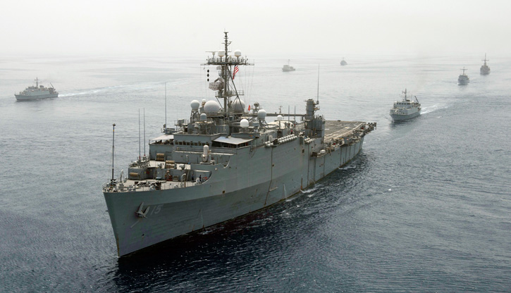 The Afloat Forward Staging Base (Interim) USS Ponce (AFSB(I)15) leads a formation of ships participating in International Mine Countermeasures Exercise (IMCMEX) 2013. Photo: U.S. Navy photo by Michael Sandberg.