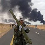 Rebel fighter holds an SA7 missile captured from Pro-Gaddafi arsenals in Benghazi. 