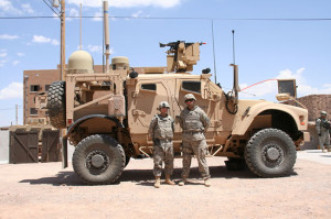 Soldiers from 2nd Brigade, 1st Armored Division, stand before a Warfighter Information Network-Tactical Increment 2 Point of Presence platform, May 17, 2012, during the WIN-T Increment 2 Initial Operational Test and Evaluation at White Sands Missile Range, N.M. Photo: Amy Walker, U.S. Army
