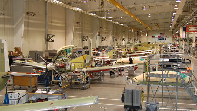 Production line of T-6B trainers at Beechcraft Corp. Wichita plant. The company is protesting the award of the LAS contract to its competitor Embraer. claiming their proposal was lower and potential loss of US jobs. Photo: Beechcraft Corp. 