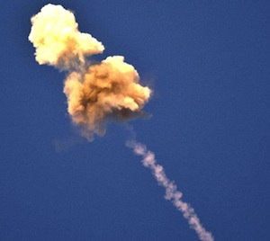 An asymmetric smoke cloud created after an explosion of the Iron Dome warhead near a target. Two 'puffs' are clearly seen.