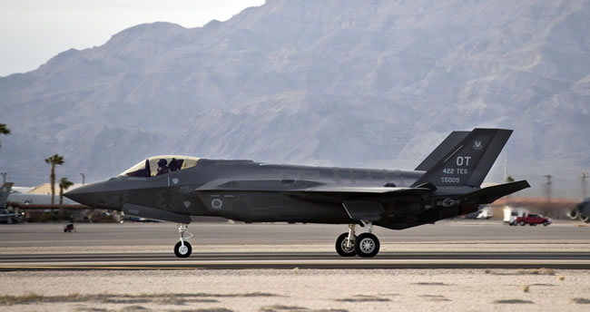 One of two Lockheed Martin F-35 Lighting IIs lands at Nellis Air Force Base, Nev., March 6, 2013. Photo: Airman 1st Class Christopher Tam, US Air Force