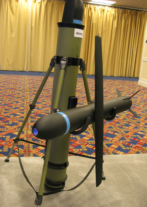 Nemesis can be launched vertically from a carrying container/launch tube. The same weapon is also configured for carrying on small UAVs, using the standard carriage system.