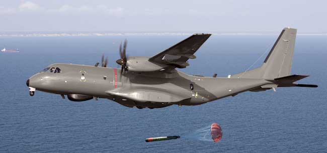 C295 dropping an antisubmarine lightweight torpedo on a maritime anti-submarine warfare exercise. The Maritime Patrol/ASW configuration of the aircraft includes a chin mounted EO/IR turret, Magnetic Anomaly Detector boom at the aft, a surface search radar and other sensors at the belly and underwing weapons stores.