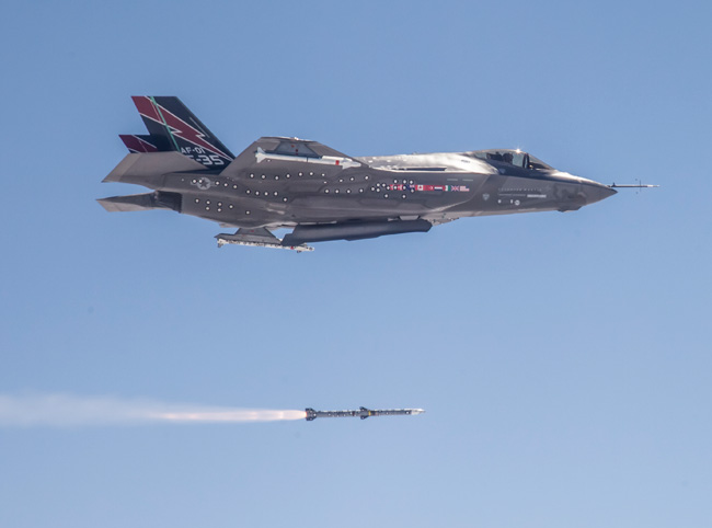 F-35A launching the first AIM-120 AMRAAM missile from the weapon's bay. The aircraft also carries two dummy AIM-9X Air/Air which will not be carried on full  stealth missions. Photo: Lockheed Martin 