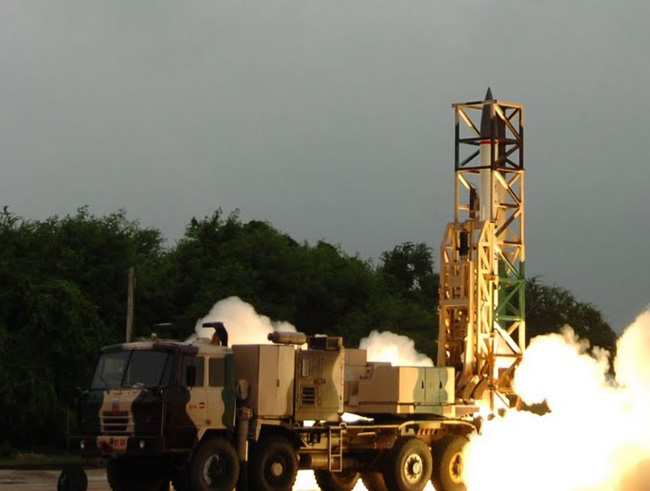 Prahar will be deployed on an 8x8 all-terrain transporter-erector-launcher vehicle carrying six missiles in sealled canisters, ready for launch. Photo: DRDO 