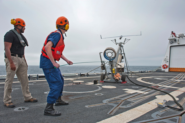 Scan Eagle UAS is launched from the aft deck of the USCG Cutter Bertholf.
