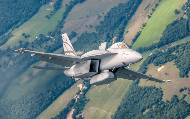 Advanced Super Hornet shown during the recent test flights, note the conformal fuel tanks over the wings and Enhanced Weapons Pod adding stealthy weapon carriage capability to the aircraft. Photo: Boeing