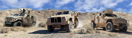 Three prototypes for the Joint Light Tactical Vehicle are undergoing testing. The AM General Prototype is on the left, Oshkosh JLTV in the center, and the Lockheed Martin prototype is on the right.