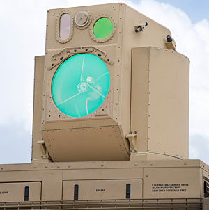 The beam director, a key part of the beam control system, is a rotating, dome-shaped turret that extends above the roof of the vehicle while engaging targets. Photo: Boeing Company.