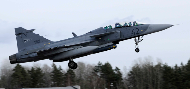 A Swedish Gripen operating under leasing agreement with the Hungarian Air Force is seen here carrying an Israeli Litening targeting pod. Brazil will also be able to integrate the Derby and Python V missiles it bought from Rafael. In the past Saab has discussed inclusion of these weapons under the Gripen NG portfolio. Photo: Saab AB