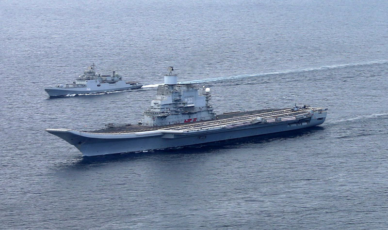 Another view of INS Vikramaditya escorted by INS Talwar. 