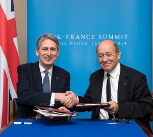Defence Secretary Philip Hammond shakes hands with the French Defence Minister Jean-Yves Le Drian at today's Anglo French Summit at RAF Brize Norton, January 31, 2014. Photo: UK MOD Croen Copyright 