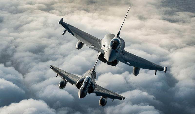 A Royal Air Force Typhoon of 1(F) Squadron (top) and a French Air Force Mirage 2000N practice their formation flying skills during Exercise Capable Eagle in October 2013. Photo: UK MOD, Crown Copyright
