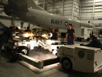 Aviation Ordnancemen assigned to Patrol Squadron (VP) 16, prepare to load a MK-54 torpedo onto a P-8A Poseidon aircraft. (Photo: U.S. Navy, by Eric A. Pastor) 