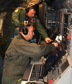The air crew of the Sentinel monitoring surveillance images collected in flight. Photo: UK MOD, Crown Copyright
