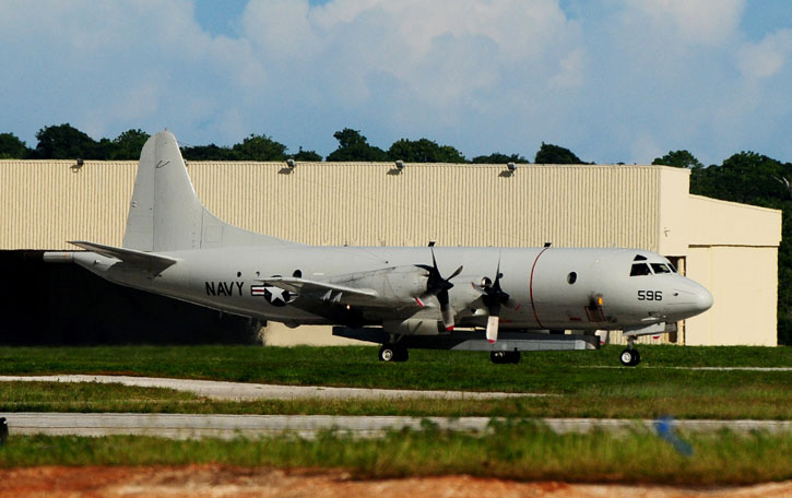 A U.S. Navy Lockheed P-3C Orion participating in the Valiant Shield 2010. The aircraft is equipped with a Raytheon AN/APS-149 Littoral Surveillance Radar System (LSRS). Note the difference between the longer, slanted box shaped LSRS and the box-shaped AAS carried under the Poseidon. US Navy Photo by Jeffrey Schultze.