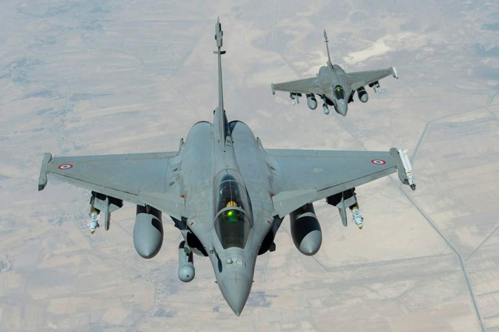 Two Rafales return from the strike mission at Mosul, 19 September 2014. Note the two missing bombs on each of the fighters. Photo: French Air Force, SIRPA AIR