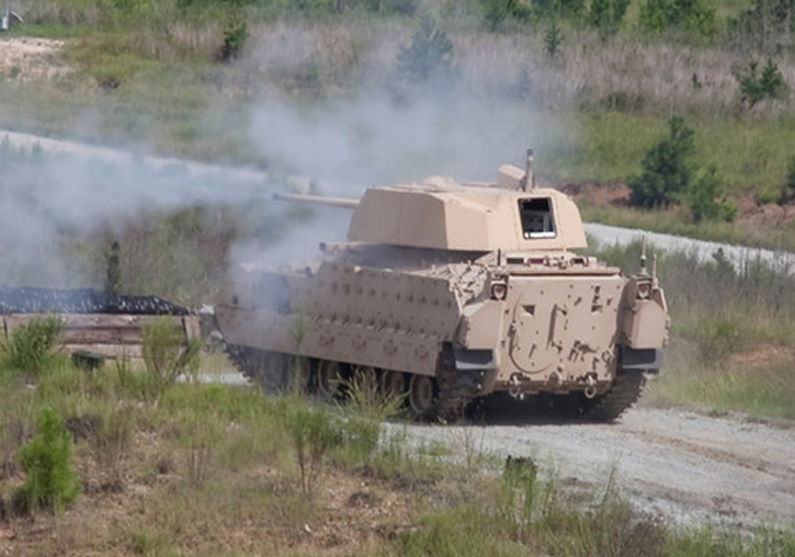 Up-gunned Bradley Fighting Vehicle fires the new XM813 30mm cannon. 