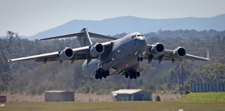 A Royal Australian Air Force (RAAF) C-17A Globemaster strategic transport aircraft departs RAAF Base Amberley, destined for the Middle East-based RAAF Air Task Group. Photo: Australian DOD by Ben Dempster.