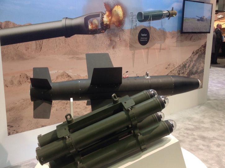 Three types of precision weapons on display at IAI's AUSA 2014 display - the Lahat, a compact laser guide bomb and Topgun, an GPS-based guidance system for artillery projectiles. 