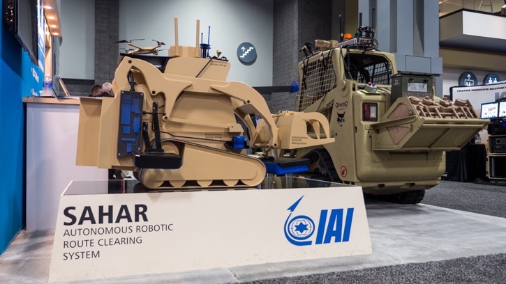 QinetiQ NA and IAI are cooperating in the development of an advanced combat engineering robot, based on remotely controlled Bobcat developed by QinetiQ. The Israeli variant is different from the U.S. Minotaur in its higher autonomy and more comprehensive sensor range. The vehicle on display, called SAHAR uses dedicated IED detecting sensors, and provides a 'mothership' for two additional robotic systems - a Dragon Runner and Hoverlite 4, yet to be announced multirotor drone developed by IAI. 