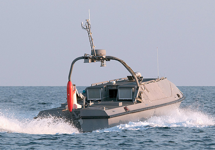 The Unmanned Influence Sweep System prototype performed well in tests during summer 2011. The orange attachment on the back of the vessel is deployed into the water and uses magnetic and acoustic signals to trick mines into exploding.