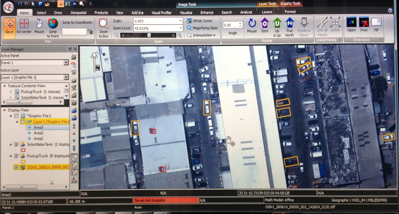 Multiple vehicles of a specific type detected by the system in a parking lot. Video Inform photo, from display