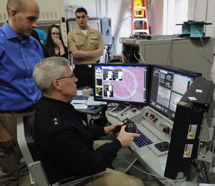 Rear Adm. Matthew Klunder, chief of naval research, tracks targets during a tour of Naval Directed Energy Center and the Office of Naval Research's (ONR) Laser Weapons System (LaWS) program at Dahlgren in March 2014. (U.S. Navy photo by John F. Williams)