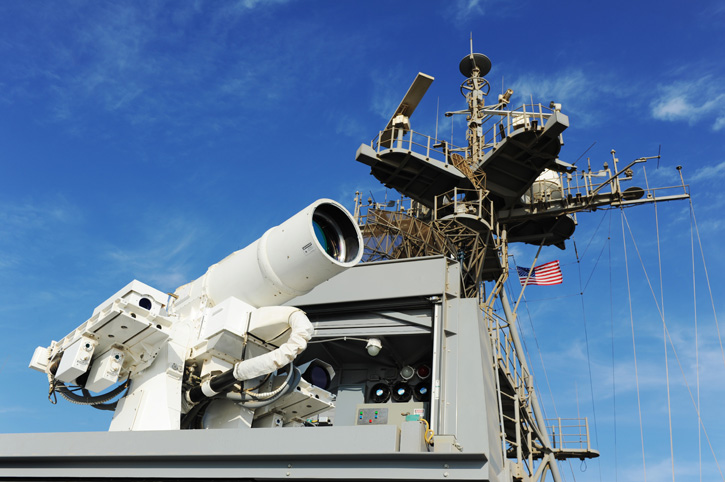 The Afloat Forward Staging Base (Interim) USS Ponce (ASB(I) 15) conducts an operational demonstration of the Office of Naval Research (ONR)-sponsored Laser Weapon System (LaWS) while deployed to the Arabian Gulf. Photo: U.S. Navy, by John F. Williams