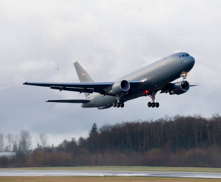 The KC-46 Pegasus development program completed its first flight of Engineering, Manufacturing and Development (EMD) aircraft #1 Dec. 28, 2014. The maiden flight took off at 9:29 AM PST from Paine Field in Everett, Washington, and landed at 1:01 PM PST at Boeing Field in Seattle.EMD #1 is a provisioned 767-2C freighter and the critical building block for the KC-46 missionized aerial refueler. Photo: Boeing