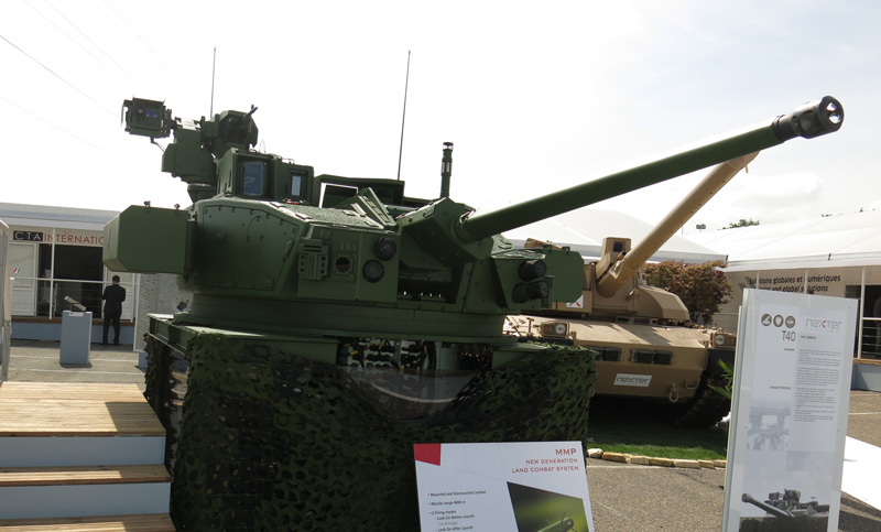 The T40 turret Nexter is developing for the ERBC integrates the CTA 40 mm cannon, MMP missiles (carried in armoured containers on the turret sides) and remotely operated 7.62mm machine gun on the top. The turret also mounts multiple optronic systems supporting the different weapons. The T40 was shown by Nexter for the first time during Eurosatory 2014. Photo: Tamir Eshel, Defense-Update