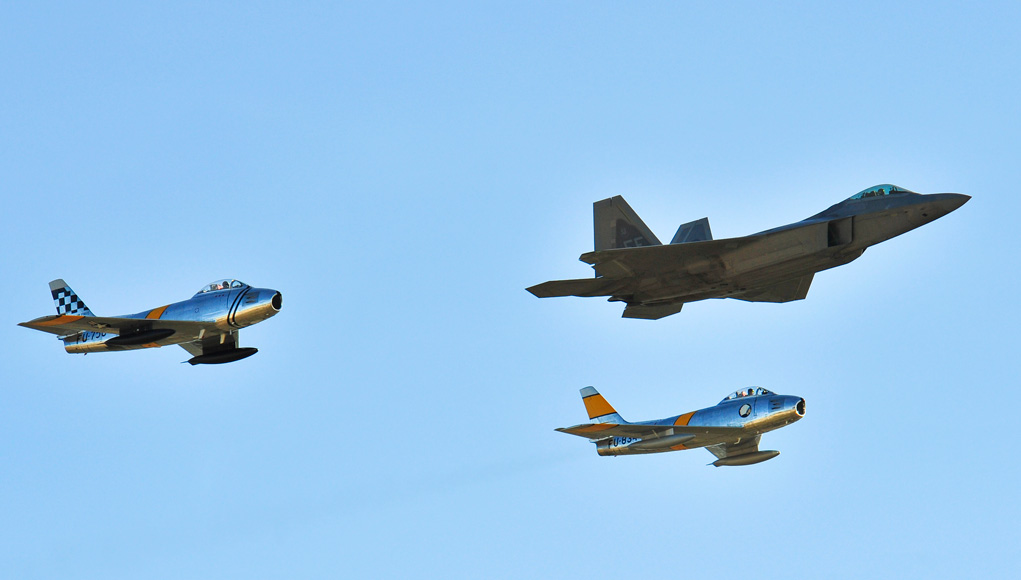 Two F-86 Sabres and an F-22 Raptor fly in formation during the 2015 Heritage Flight Training and Certification Course at Davis-Monthan Air Force Base, Ariz., Feb. 27, 2015. (USAF photo by Chris Massey)