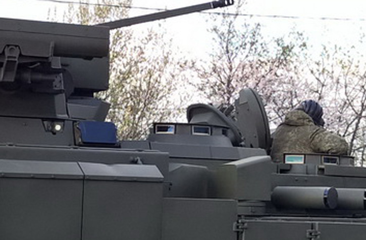 The commander and weapon operator both have vision blocks surrounding their cupola, providing relatively good peripheral vision under armor. For complete coverage, panoramic cameras are positioned around the vehicle. One pair of these cameras can be seen left of the flat sensor under the Kornet missile launcher tubes.  