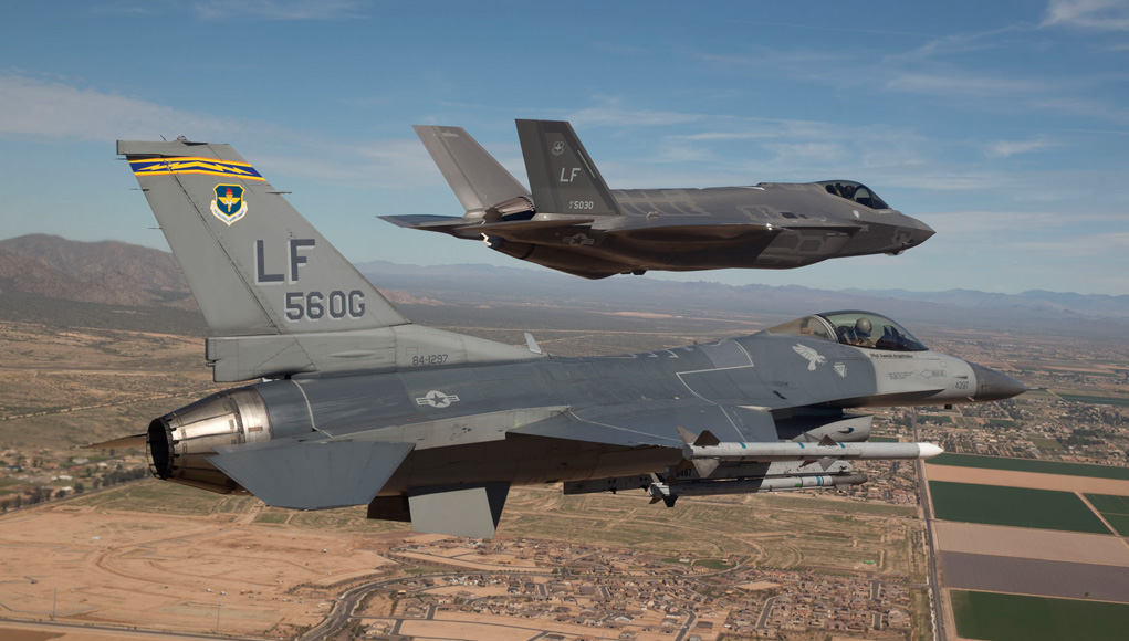 4GEN welcomes 5 GEN: The first F-35 arrives at Luke Air Force Base, Ariz., escorted by an F-16. (Photo: USAF by Jim Hazeltine)