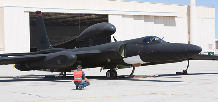 A technician completes final pre-flight checks on a U-2 Dragon Lady before an Open Mission Systems demonstration flight in which fighter aircraft from multiple generations and services exchange penetrating Intelligence, Surveillance, and Reconnaissance, Electronic Warfare and signals intelligence data. Photo: Lockheed Martin