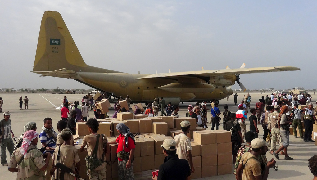 Royal Saudi Air Force C-130 delivers supplies to the International airport of Aden, Yemen, recently taken by Yemeni forces loyal to ousted president  Abd Rabbuh Mansur Hadi