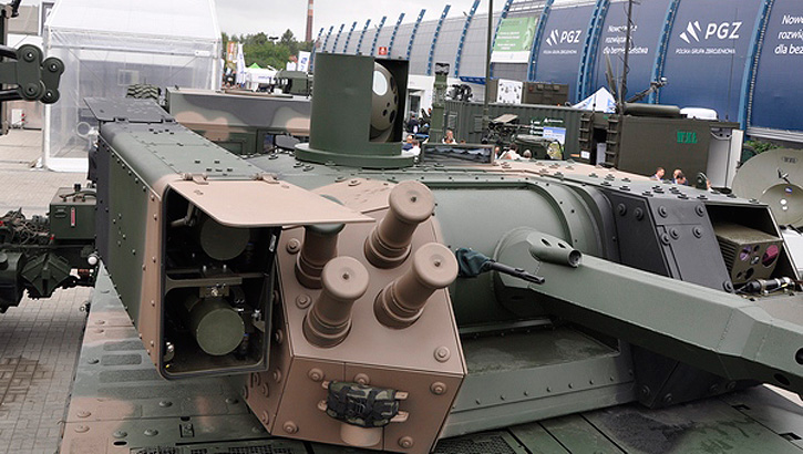 The ZSSW-30 turret mounts the ATK Mk44 30mm chain gun, 7.62 mm coaxial machinegun and two Spike LR missiles.  
