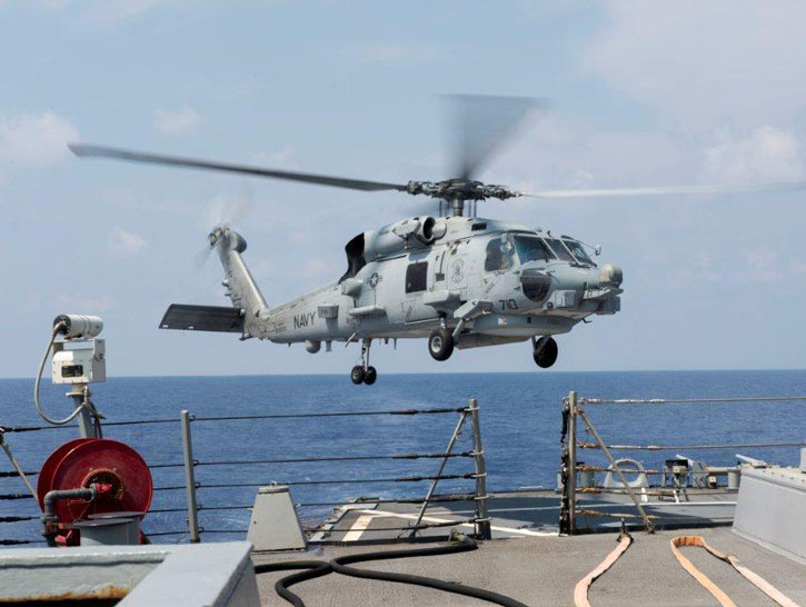 An SH-60F Sea Hawk helicopter prepares to land aboard the guided-missile destroyer USS Gonzalez (DDG 66). Gonzalez is underway participating in a Composite Training Unit Exercise with the Harry S. Truman Strike Group. (U.S. Navy Photo by D. C. Ortega)