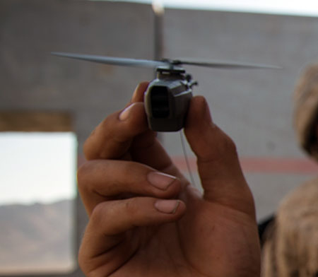 The PD100 Black Hornet weighs only 18 grams and mounts a daylight or infrared camera that delivers detailed imagery from distance of 600-1400 meters. Photo: USMC 